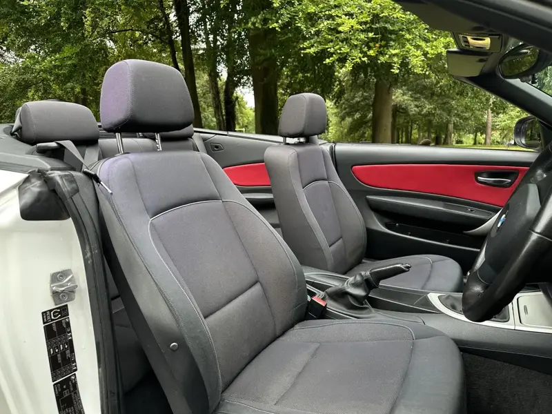 Burgundy leather door cards with the roof down