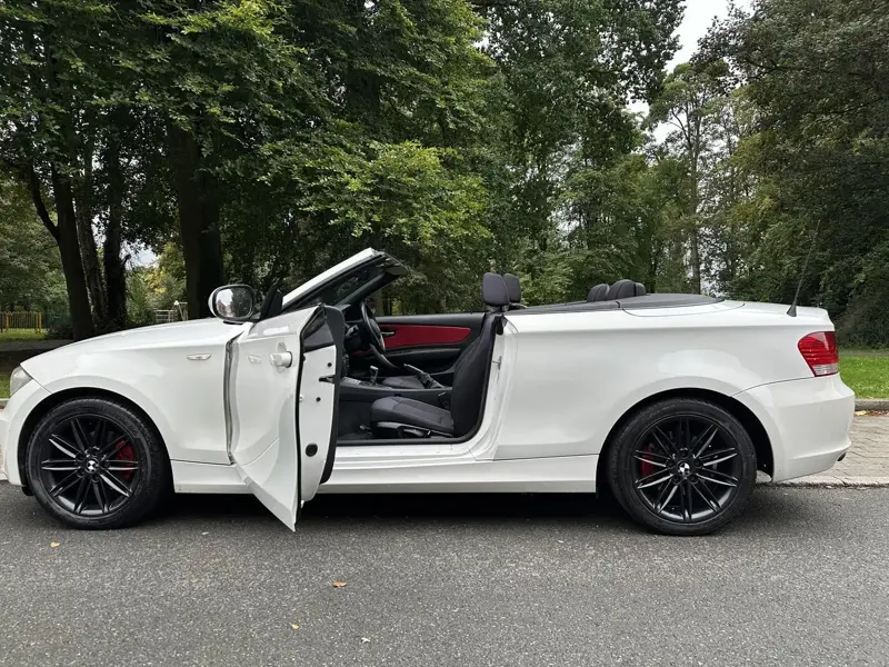 White BMW 1 Series Convertible with burgundy interior